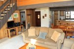 Mammoth Lakes Vacation Rental Sunrise 35 - Open Floor Plan Living Room with Flat Screen TV, Condo Entrance